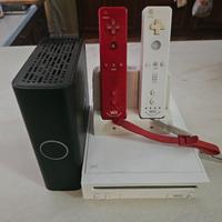 Nintendo wii + joystick + unità ext. con giochi