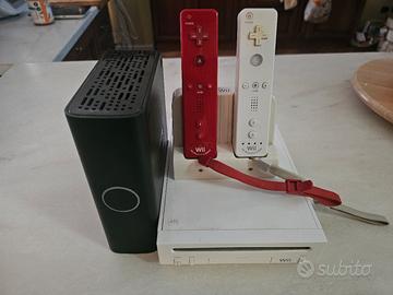 Nintendo wii + joystick + unità ext. con giochi