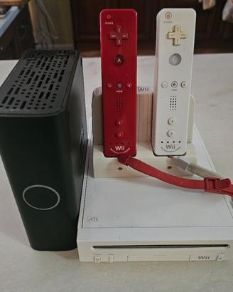 Nintendo wii + joystick + unità ext. con giochi