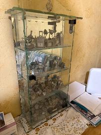 Vetrina collezione miniature di orologi vari