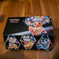 scatola eevee + lotto carte
