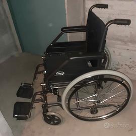 carrozzina/sedia a rotelle 