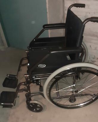 carrozzina/sedia a rotelle 