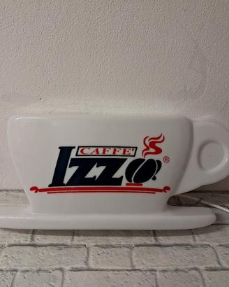 Insegna Luminosa Caffè Izzo a forma di tazzina.