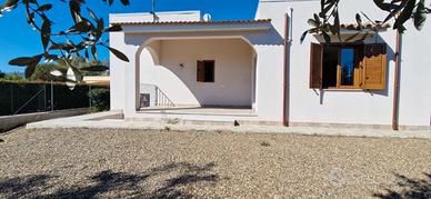 Porzione di Villa Bifamiliare con giardino