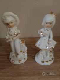 Coppia di statuette vintage P