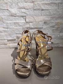 SANDALO ORO ARGENTO BRONZO