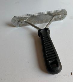 Rastrello tolettatura cane