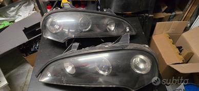 FARI ANTERIORI ANGEL EYES CCFL NERO PER OPEL TIGRA