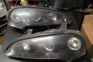 FARI ANTERIORI ANGEL EYES CCFL NERO PER OPEL TIGRA