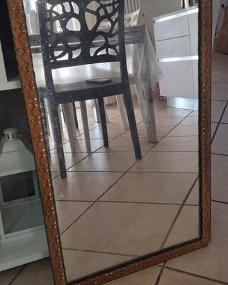Specchio artigianale in ferro battuto.