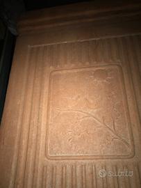 Stufa a legna in terracotta marchiata