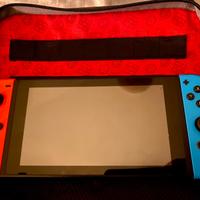 Nintendo Switch + accessori + 2 giochi