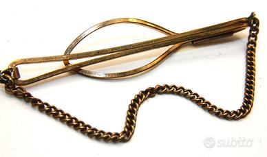 Splendido fermacravatta oro su argento