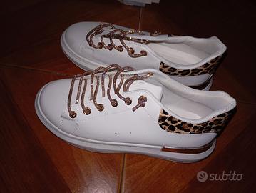 scarpe bianche e tigrate da donna 