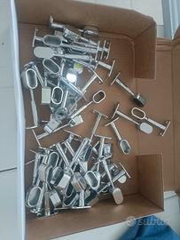 Ganci  per barre appendiabiti 