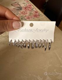 6 paia di orecchini color argento