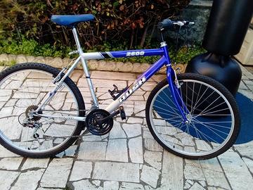 Bicicletta/Mountain Bike-Nuova-Cambio Shimano-