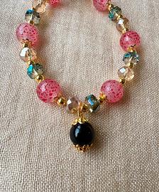 Braccialetto perle colorate rosa su coccu kokku