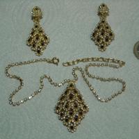 Parure orecchini clip e ciondolo