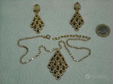 Parure orecchini clip e ciondolo