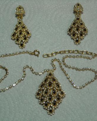 Parure orecchini clip e ciondolo