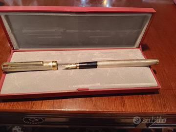 Penna stilografica kaminara argento e dorata