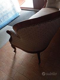 Poltrona vintage in legno intagliato