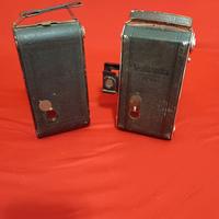 Coppia di macchine fotografiche a fisarmonica