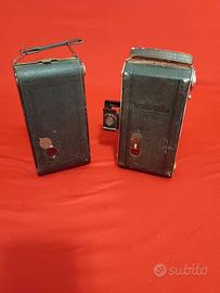 Coppia di macchine fotografiche a fisarmonica