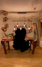 Lampadario con bastone di bamboo e filo arrotolato