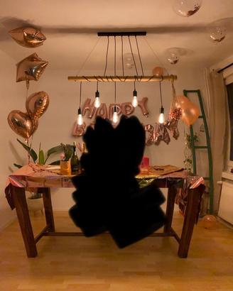 Lampadario con bastone di bamboo e filo arrotolato