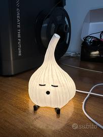 Lampada da tavolo a forma d’aglio