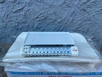 Bilancia pesa bambini e alimenti