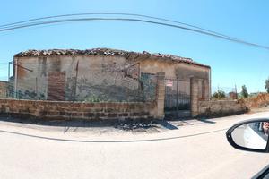 Terreno con casa