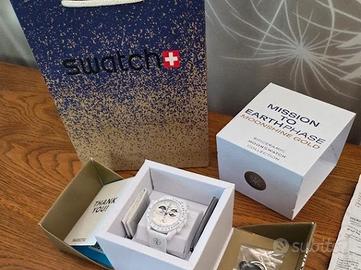 Omega Swatch Earthphase Moonshine gold nuovo