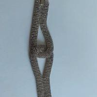 Bracciale brillante di bigiotteria