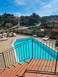 TRILOCALE CON PISCINA E PARCHEGGIO RISERVATO 