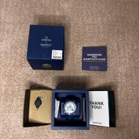 Omega x swatch mission on earthphase moonshine gol