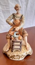 Statuetta di ciabattino in ceramica numerata