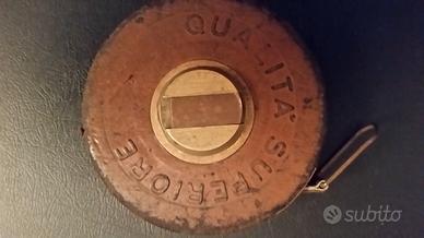 ANTICA BINDELLA IN CUOIO E OTTONE