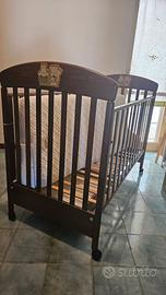 Lettino con materasso e paracolpi