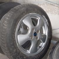 4 cerchi in lega + gomme invernali per Cubo Fiorin