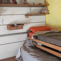 cameretta con letti scorrevoli