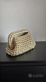 Pochette oro  all’uncinetto