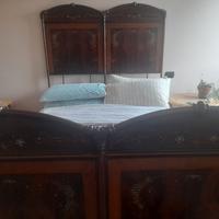 Letto antico in ferro battuto