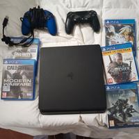 Ps4 slim +2 joystick + 5 giochi