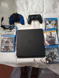 Ps4 slim +2 joystick + 5 giochi