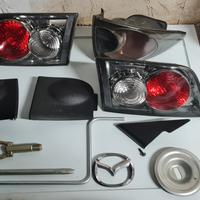 frecce, fari posteriori , logo, plastiche mazda 6 