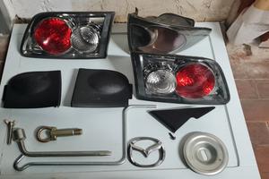 frecce, fari posteriori , logo, plastiche mazda 6 